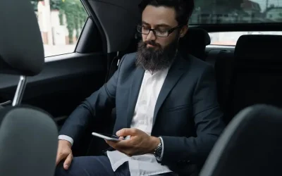 businessman-while-traveling-by-car-back-seat-using-smartphone_158595-4236 businessman-while-traveling-by-car-back-seat-using-smartphone_158595-4236
